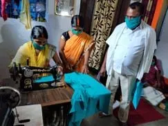 Masks being made at the sewing centre for villagers during COVID-19.
